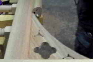 The decorative shaped panel that sits between the top rail capping and hanging stile of the Victorian gates
