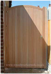 Handcrafted curved topped wooden gates